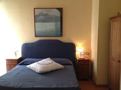 Letto o letti in una camera di B&B Bonapace Portanolana