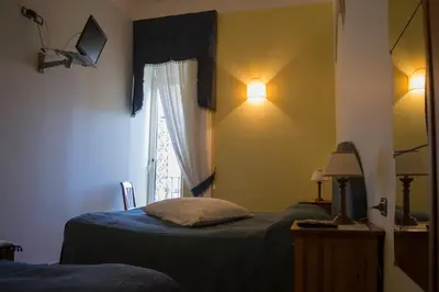 Letto o letti in una camera di B&B Bonapace Portanolana