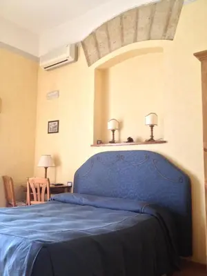 Letto o letti in una camera di B&B Bonapace Portanolana
