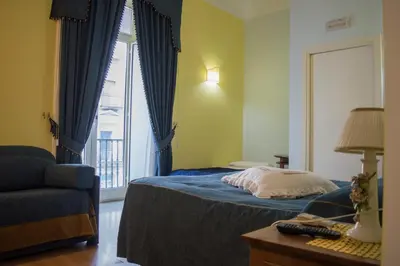 Letto o letti in una camera di B&B Bonapace Portanolana