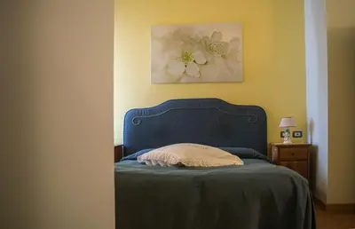 Letto o letti in una camera di B&B Bonapace Portanolana