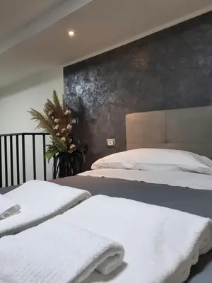 Letto o letti in una camera di L'Approdo di Dante