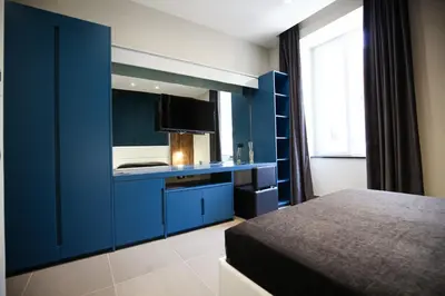 Letto o letti in una camera di Gramsci 21 Rooms