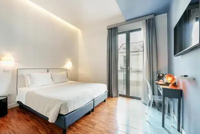 Letto o letti in una camera di Attico Partenopeo