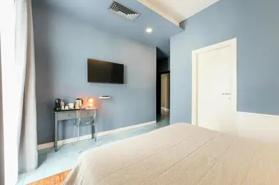 Letto o letti in una camera di Attico Partenopeo