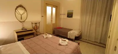 Letto o letti in una camera di Casa Lillina a Toledo , near Piazza del plebiscito
