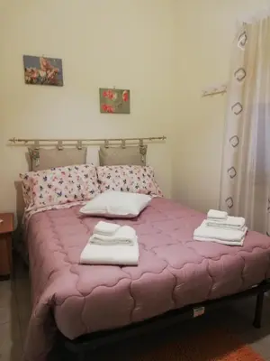 Letto o letti in una camera di Casa Lillina a Toledo , near Piazza del plebiscito