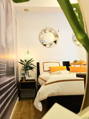 Letto o letti in una camera di Daily Napoli - Lungomare