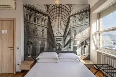 Letto o letti in una camera di De Gasperi 55