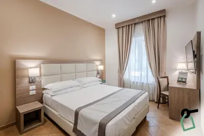 Letto o letti in una camera di Residenza Scarlatti Napoli