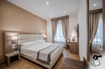 Letto o letti in una camera di Residenza Scarlatti Napoli
