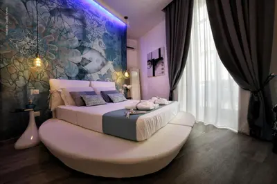 Letto o letti in una camera di Bourbon House