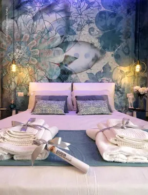 Letto o letti in una camera di Bourbon House