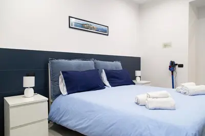Letto o letti in una camera di Casa Massa
