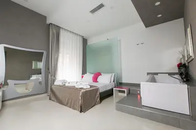 Letto o letti in una camera di Hotel Nunù