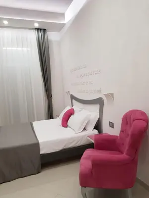 Letto o letti in una camera di Hotel Nunù