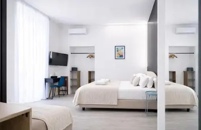 Letto o letti in una camera di B&B Università