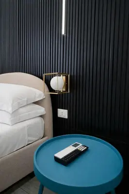 Letto o letti in una camera di B&B Università