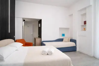 Letto o letti in una camera di B&B Università