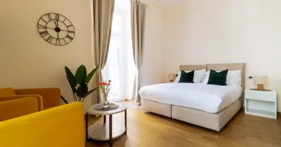 Letto o letti in una camera di Musto Suites & Rooms