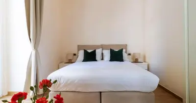 Letto o letti in una camera di Musto Suites & Rooms