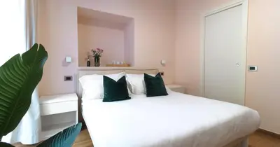 Letto o letti in una camera di Musto Suites & Rooms