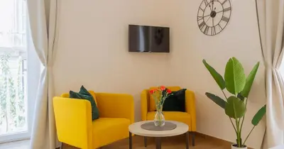 TV o dispositivi per l'intrattenimento presso Musto Suites & Rooms