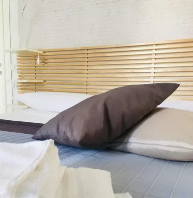 Letto o letti in una camera di Domus Alma