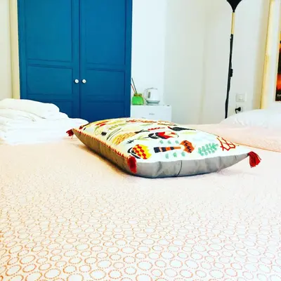 Letto o letti in una camera di Domus Alma