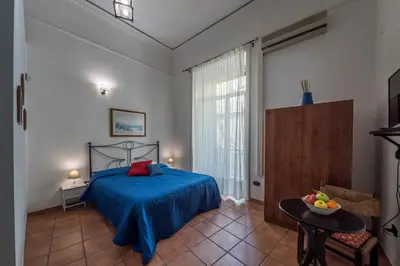 Letto o letti in una camera di 'Na Siesta