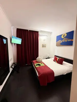 Letto o letti in una camera di Hotel Plebiscito Aparthotel