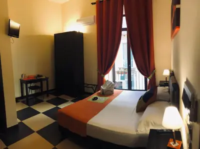Letto o letti in una camera di Hotel Plebiscito Aparthotel