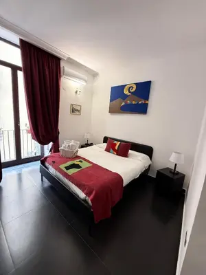 Letto o letti in una camera di Hotel Plebiscito Aparthotel