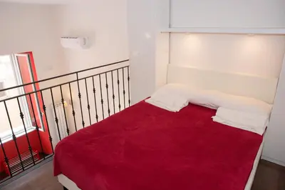 Letto o letti in una camera di Appartamenti Mergellina