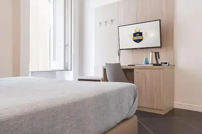 Letto o letti in una camera di Borbo de Charme