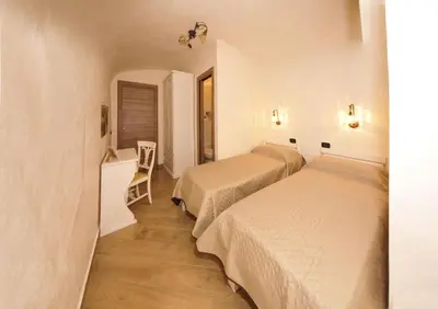 Letto o letti in una camera di Look House