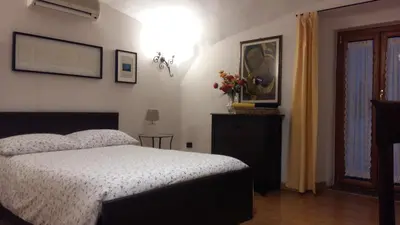 Letto o letti in una camera di L' Arcata a Montesanto