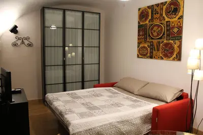 Letto o letti in una camera di L' Arcata a Montesanto