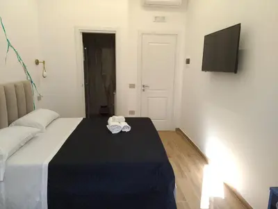 Letto o letti in una camera di Maison Arena