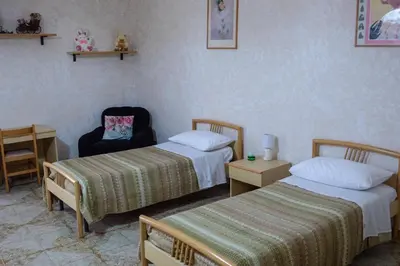 Letto o letti in una camera di La bella Napoli