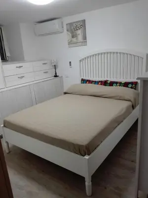 Letto o letti in una camera di Appartamento Beverello