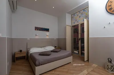 Letto o letti in una camera di B&B Residenza Alba