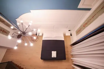 Letto o letti in una camera di The Dante House by House In Naples