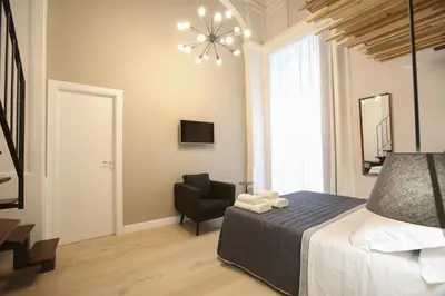 Letto o letti in una camera di The Dante House by House In Naples