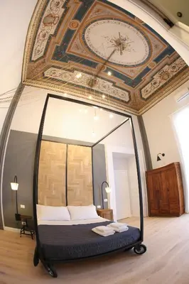 Letto o letti in una camera di The Dante House by House In Naples