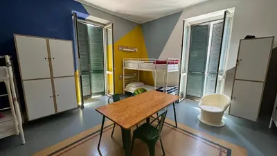 Area soggiorno di La Controra Hostel Naples