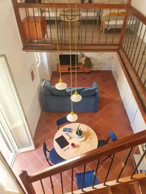 Letto o letti in una camera di La Controra Hostel Naples
