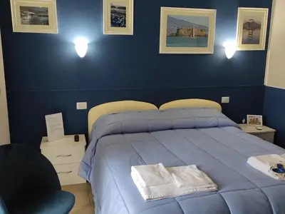Letto o letti in una camera di Il Viaggio di Dante Historical Center