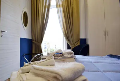 Letto o letti in una camera di Il Viaggio di Dante Historical Center