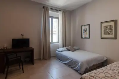 Letto o letti in una camera di Napajè